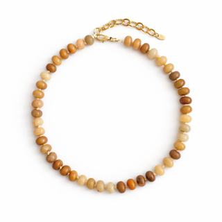 Single-strand tan and brown beaded necklace with gold-toned chain and clasp