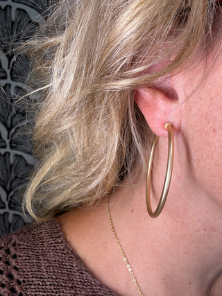 Gold Hoop Earrings – Matte Gold – model photo
