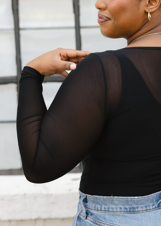 Elietian Seamless Sheer Mesh Top in Black, close-up of the sheer sleeve
