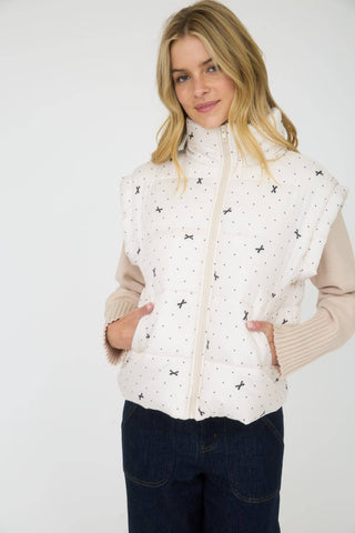 Polka Dot Puffer Vest with Bow Pattern