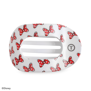 White flat round hair clip with red Minnie bow pattern and silver bar.