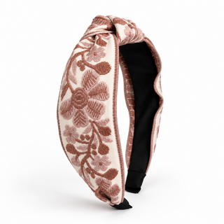 Blush floral woven headband with embroidered floral leaves and black interior