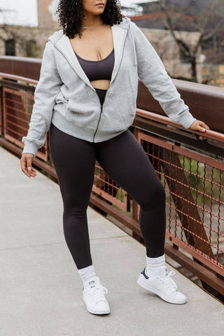 Elietian Ribbed High Waist Leggings in Black on a curvy model, styled with a grey zip hoodie