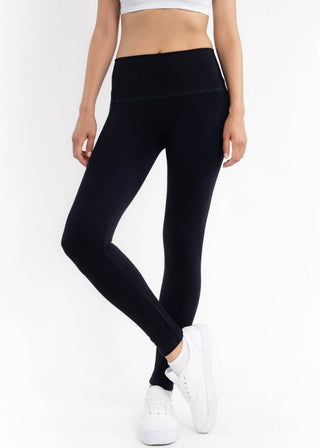 Fleece-lined leggings in dark navy, full-length with smooth flat waistband.