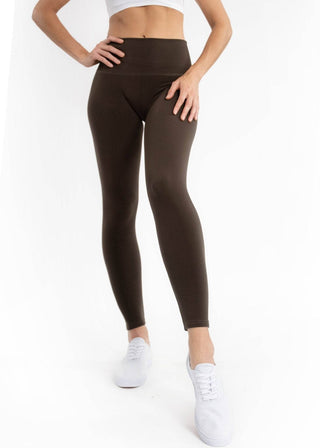 Fleece-lined high-waist leggings in dark olive, full-length front view on model