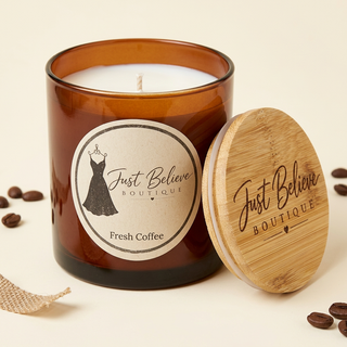 Handmade soy candle in amber glass jar with bamboo lid; Fresh Coffee label