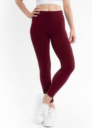 Burgundy high-waisted leggings with smooth, fitted stretch fabric