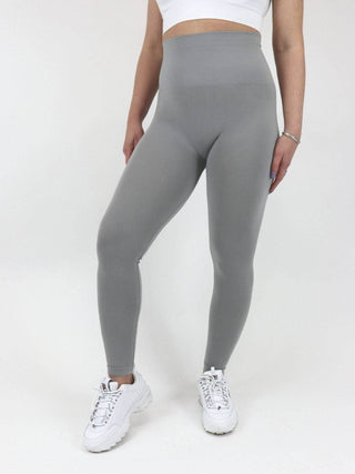 High-waisted grey leggings, full length with smooth stretch fabric.