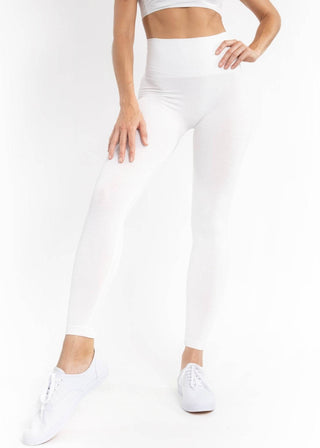 White high-waisted leggings, full length with smooth fitted waist and legs