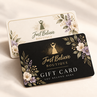 Black gift card with floral border, 'Just Believe Boutique' and 'Gift Card' text