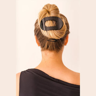 TELETIES Jet Black snap clip securing a bun