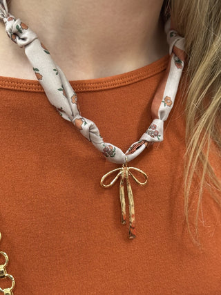 Handmade Scarf Charm Necklace – Rust Floral with Bow – model photo