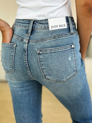 Judy Blue Full Size Mid Rise Destroyed Hem Distressed Jeans - Just Believe Boutique
