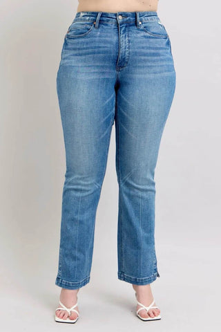 Front view of plus-size model in Judy Blue Vintage Wash Boot Jeans with tummy control and slim bootcut leg for a flattering fit.