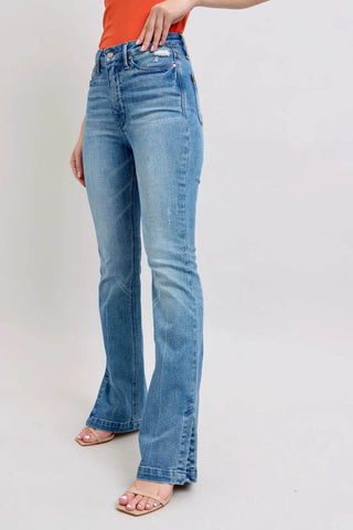 Side angle of Judy Blue slim boot jeans showing high-rise fit and vintage wash, ideal for casual and chic styling.