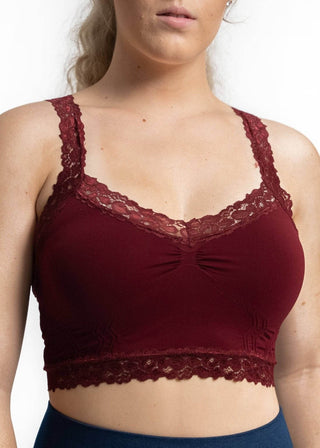 Burgundy lace bralette with scalloped lace trim, wide straps, and ruched bust