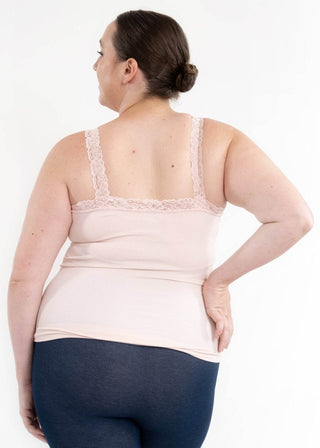 Curvy lace cami top, back view with lace straps and light cream tone