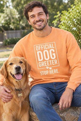 Man wearing the Cantaloupe Official Dog Greeter Sweatshirt