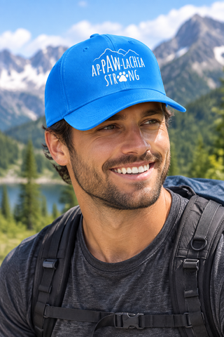 Man wearing the blue ApPAWlachia Strong Baseball Cap