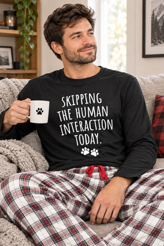 Man wearing the Skipping the Human Interaction pajama top