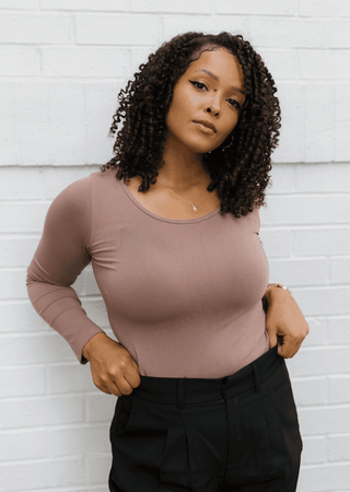 Mauve long-sleeve crewneck top, fitted curvy fit, with smooth stretch fabric.
