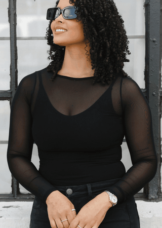 Black sheer long sleeve top with scoop neckline and fitted bodice
