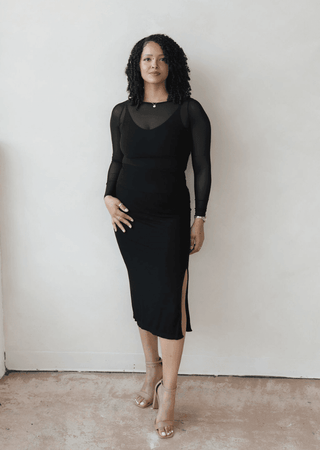 Black sheer long sleeve top with scoop neckline and long sleeves