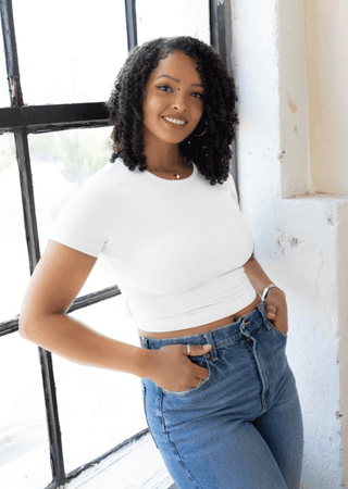 White waist-length crewneck short-sleeve top, fitted silhouette