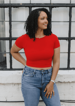Red waist-length short-sleeve crewneck top, fitted knit