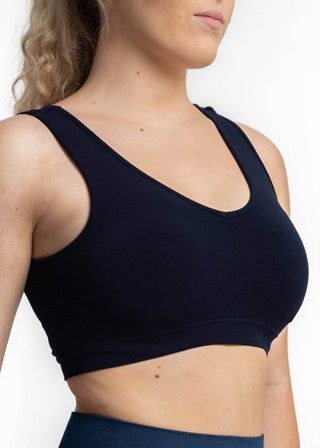 Navy V-neck wireless bra with wide straps, cropped front view