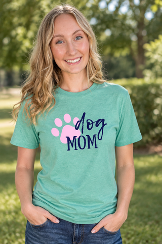 Woman smiling while wearing the Dog Mom Tee