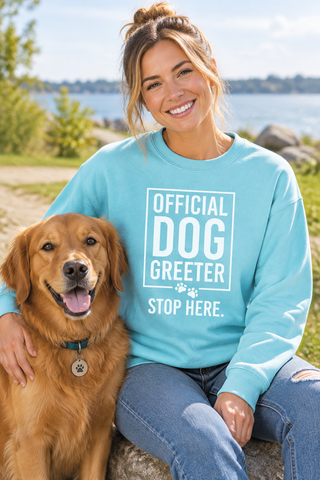 Woman wearing the Purist Blue Official Dog Greeter Sweatshirt