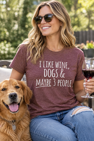 Woman wearing the I Like Wine, Dogs & Maybe 3 People Tee