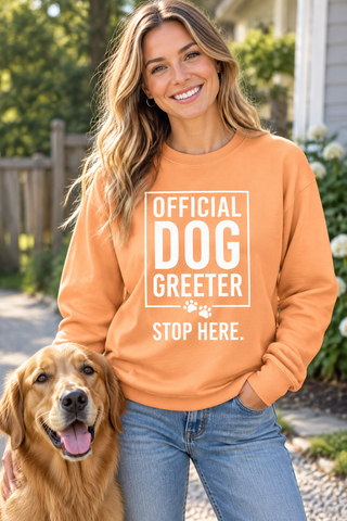 Woman wearing the Official Dog Greeter Sweatshirt