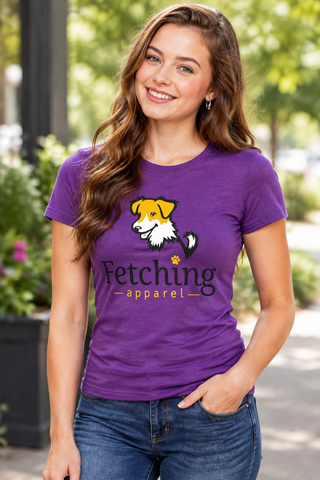 Woman wearing a purple Fetching fitted tee with the rescue dog graphic