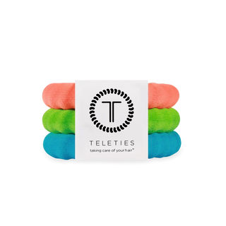 Nylon hair ties set in orange, green, and blue, bundled with logo tag